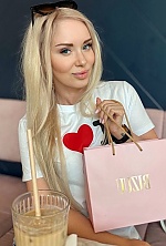 Ukrainian mail order bride Victoria from Warsaw with blonde hair and blue eye color - image 3