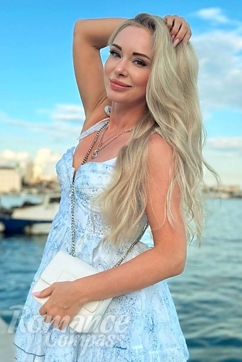Ukrainian mail order bride Victoria from Warsaw with blonde hair and blue eye color - image 1