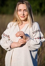 Ukrainian mail order bride Oksana from Kyiv with light brown hair and blue eye color - image 6