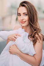 Ukrainian mail order bride Oksana from Kyiv with light brown hair and blue eye color - image 5