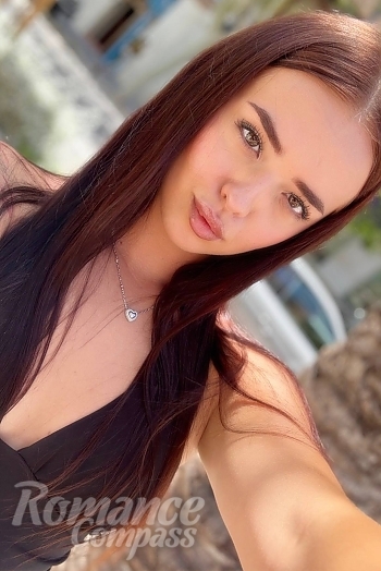 Ukrainian mail order bride Valeriia from Madrid with light brown hair and grey eye color - image 1