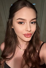 Ukrainian mail order bride Yuliia from Kyiv with light brown hair and brown eye color - image 4