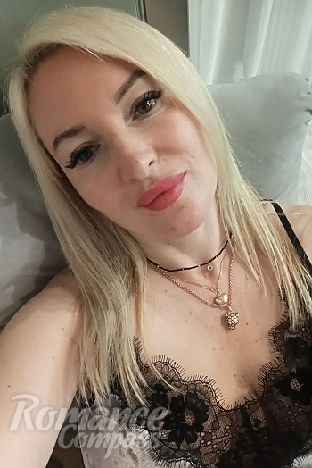 Ukrainian mail order bride Svitlana from Lviv with blonde hair and green eye color - image 1