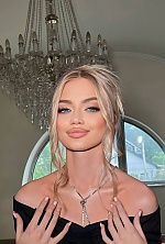 Ukrainian mail order bride Alina from Lviv with blonde hair and blue eye color - image 4