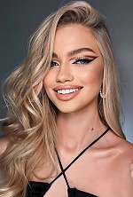 Ukrainian mail order bride Alina from Lviv with blonde hair and blue eye color - image 2
