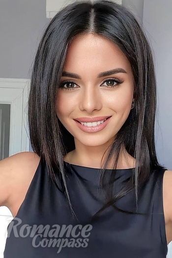 Ukrainian mail order bride Olesya from Chisinau with black hair and hazel eye color - image 1