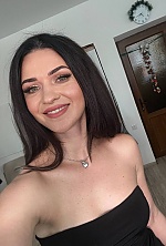 Ukrainian mail order bride Hanna from Kamyanets-Podilskyi with black hair and green eye color - image 4