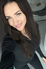 Ukrainian mail order bride Hanna from Kamyanets-Podilskyi with black hair and green eye color - image 3