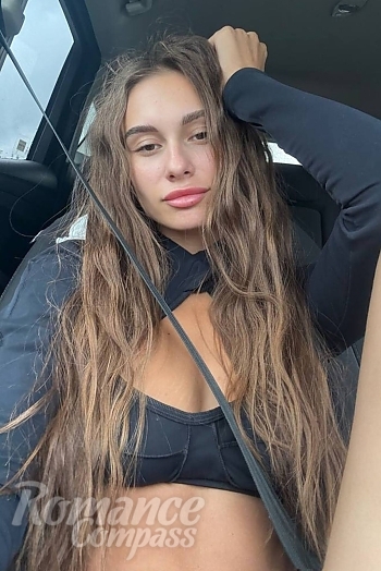 Ukrainian mail order bride Diana from Sofia with light brown hair and hazel eye color - image 1
