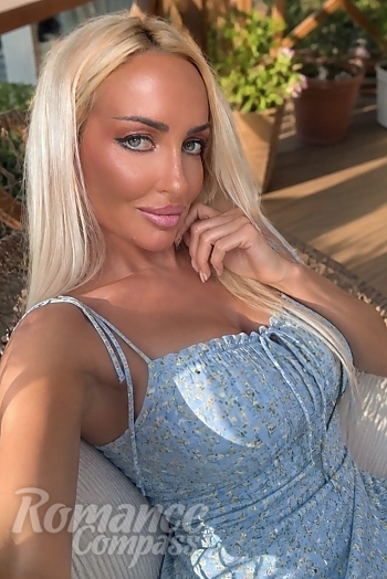 Ukrainian mail order bride Lina from Sofia with blonde hair and blue eye color - image 1