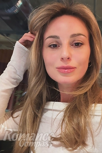 Ukrainian mail order bride Kristina from Boston with light brown hair and brown eye color - image 1
