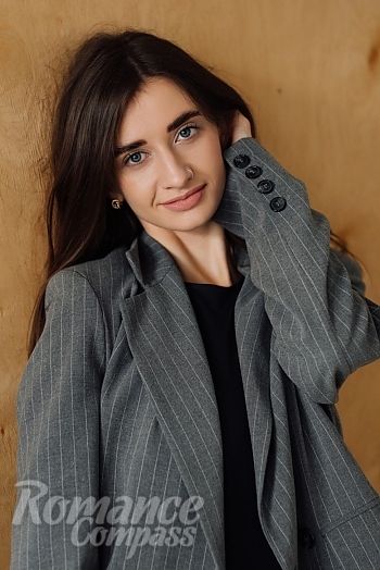 Ukrainian mail order bride Anna from Kyiv with brunette hair and blue eye color - image 1