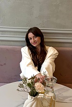 Ukrainian mail order bride Anna from Kyiv with brunette hair and blue eye color - image 8