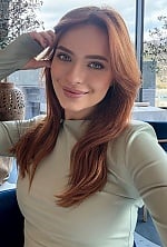 Ukrainian mail order bride Kateryna from Lviv with red hair and green eye color - image 9
