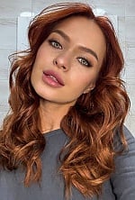 Ukrainian mail order bride Kateryna from Lviv with red hair and green eye color - image 5