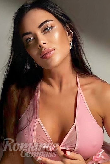 Ukrainian mail order bride Natalia from Kyiv with black hair and green eye color - image 1