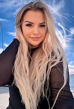 Ukrainian mail order bride Tetiana from Kyiv with blonde hair and green eye color - image 7