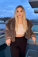 Ukrainian mail order bride Tetiana from Kyiv with blonde hair and green eye color - image 9