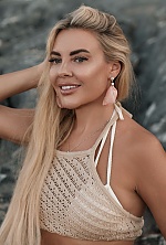Ukrainian mail order bride Inna from Odesa with blonde hair and green eye color - image 8