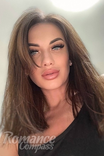Ukrainian mail order bride Taisiia from Calgary with brunette hair and blue eye color - image 1