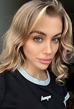 Ukrainian mail order bride Anna from Kyiv with light brown hair and green eye color - image 3