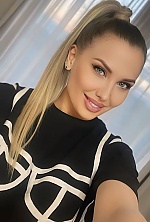 Ukrainian mail order bride Anna from Kyiv with light brown hair and green eye color - image 7
