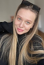 Ukrainian mail order bride Anastasia from Berlin with light brown hair and green eye color - image 7
