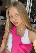 Ukrainian mail order bride Anastasia from Berlin with light brown hair and green eye color - image 8