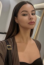 Ukrainian mail order bride Olena from Kyiv with brunette hair and green eye color - image 9