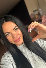 Ukrainian mail order bride Olena from Braine-l'Alleud with black hair and blue eye color - image 7