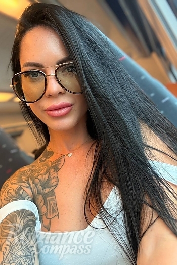 Ukrainian mail order bride Olena from Braine-l'Alleud with black hair and blue eye color - image 1
