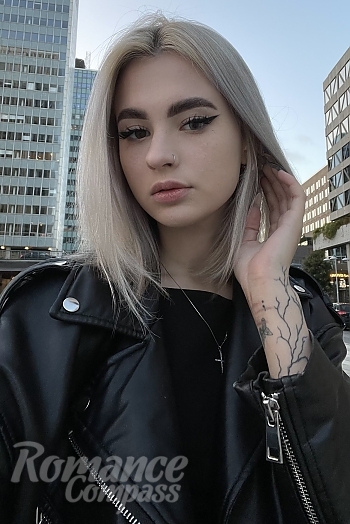 Ukrainian mail order bride Olesia from Kyiv with light brown hair and brown eye color - image 1