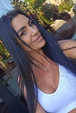 Ukrainian mail order bride Yulia from Kyiv with black hair and brown eye color - image 13
