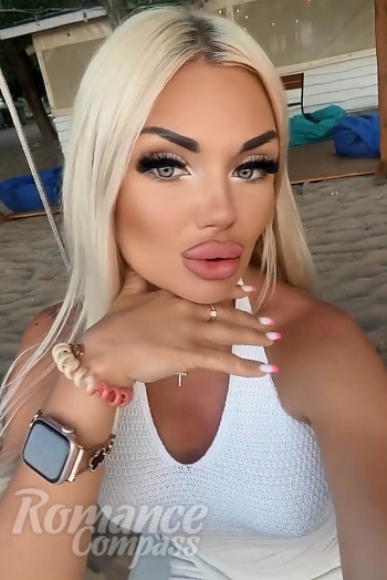 Ukrainian mail order bride Yana from Lisbon with blonde hair and blue eye color - image 1