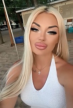 Ukrainian mail order bride Yana from Lisbon with blonde hair and blue eye color - image 4