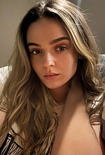 Ukrainian mail order bride Valeriia from Kyiv with light brown hair and green eye color - image 7