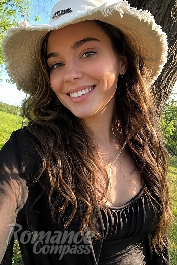 Ukrainian mail order bride Valeriia from Kyiv with light brown hair and green eye color - image 1