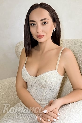 Ukrainian mail order bride Ekaterina from Kyiv with black hair and green eye color - image 1