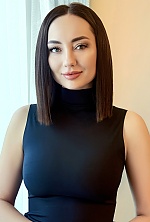 Ukrainian mail order bride Ekaterina from Kyiv with black hair and green eye color - image 5