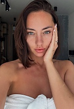 Ukrainian mail order bride Ekaterina from Kyiv with black hair and green eye color - image 11