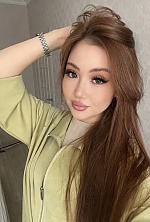 Ukrainian mail order bride Skhahnaz from Astana with black hair and grey eye color - image 7