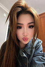 Ukrainian mail order bride Skhahnaz from Astana with black hair and grey eye color - image 5