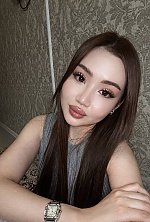 Ukrainian mail order bride Skhahnaz from Astana with black hair and grey eye color - image 3