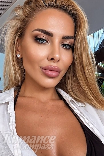 Ukrainian mail order bride Anna from Kyiv with blonde hair and blue eye color - image 1