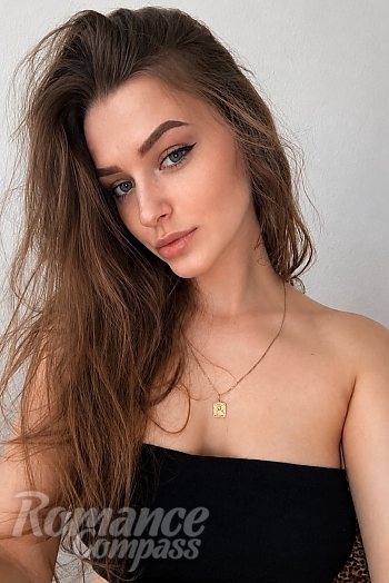 Ukrainian mail order bride Victoria from Kyiv with light brown hair and grey eye color - image 1