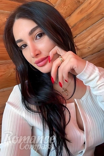 Ukrainian mail order bride Maia from Tbilisi with black hair and brown eye color - image 1