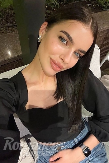 Ukrainian mail order bride Ekaterina from Kyiv with black hair and blue eye color - image 1