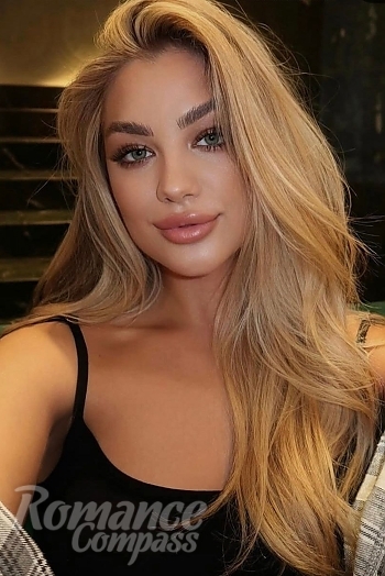 Ukrainian mail order bride Natalia from Kharkiv with blonde hair and green eye color - image 1
