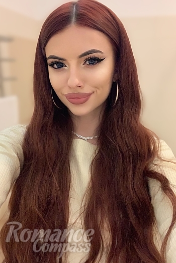 Ukrainian mail order bride Valeria from Odesa with red hair and green eye color - image 1