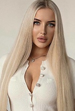 Ukrainian mail order bride Olga from Kyiv with blonde hair and blue eye color - image 11
